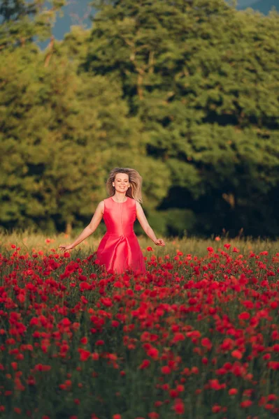 Beautiful Woman Enjoying Nice Day Poppy Field Wearing Red Dress — Stock Photo, Image