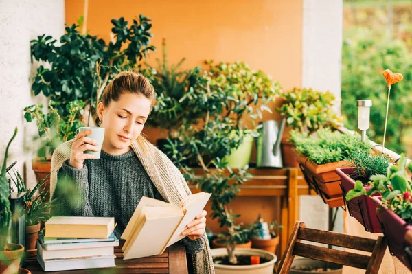 Young Beautiful Woman Relaxing Cozy Balcony Reading Book Wearing Warm — Stock Photo, Image