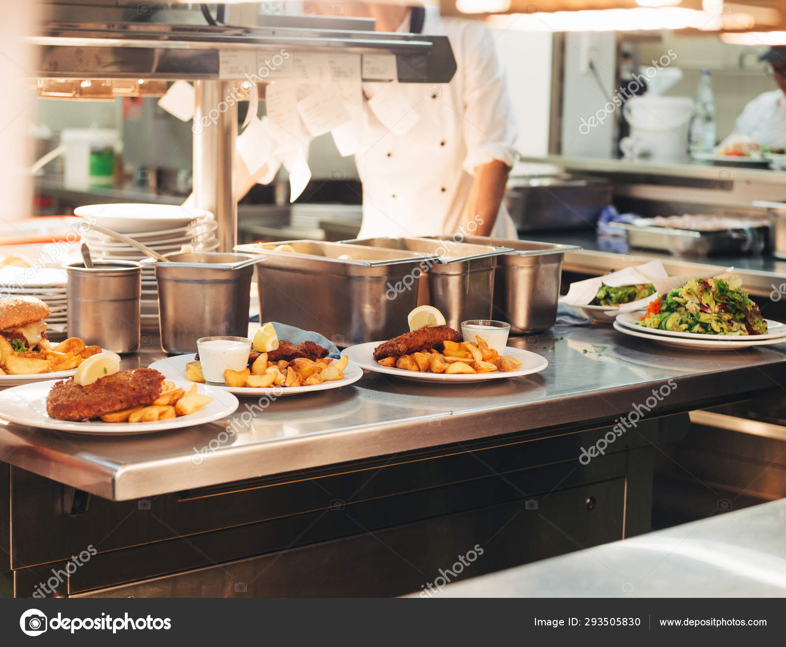 Food Orders Kitchen Table Restaurant Chief Decorating Schnitzel Fried Potatoes Stock Photo Annanahabed 293505830
