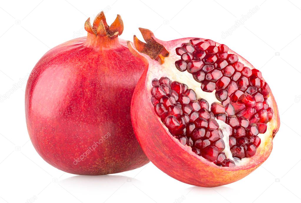 Ripe pomegranates isolated on white background