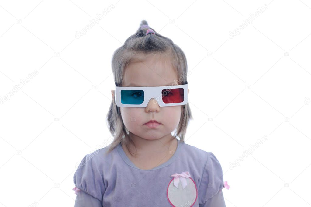 little baby girl in 3D anaglyph cinema glasses for stereo image system with polarization. 3D goggles with red and blue eyes