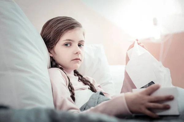 Sad little female looking straight at camera — Stock Photo, Image