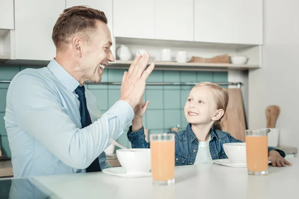 Happy family spending morning with pleasure — Stock Photo, Image