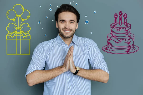 Happy man clapping while having a birthday party — Stock Photo, Image