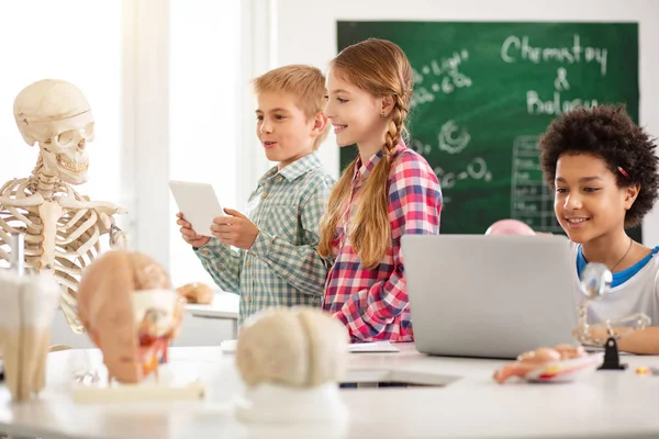 Happy delighted children enjoying their class — Stock Photo, Image