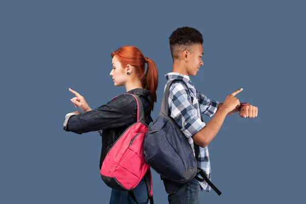 Modern young people using their gadgets — Stock Photo, Image