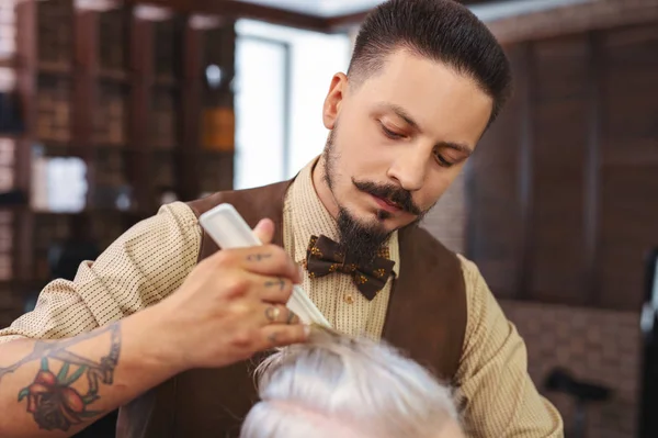 Portrait of serious male person that doing his job — Stock Photo, Image