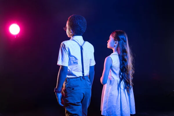 Lovely kids looking in the distance — Stock Photo, Image