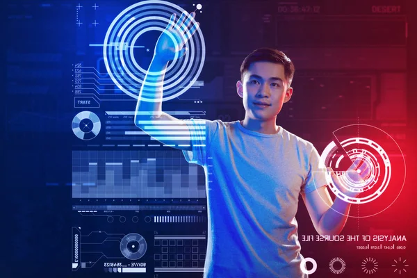 Calm programmer looking relaxed while touching the screen with his two hands — Stock Photo, Image