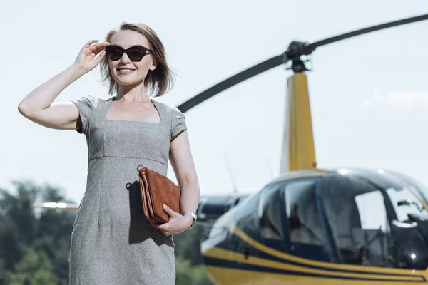 stock image Joyful female CEO being ready for a helicopter ride