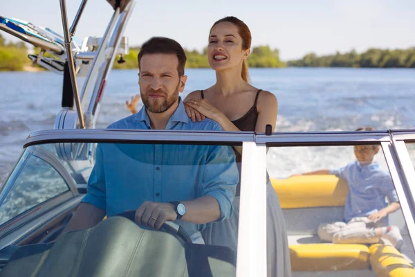 Pleasant young woman enjoying yacht ride — Stock Photo, Image