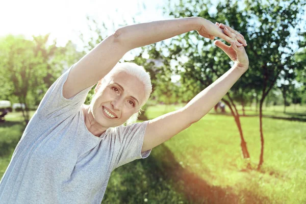 Happy pensioner looking happy at the training — Stock Photo, Image