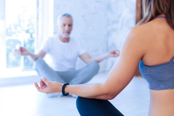 Silhouette of elderly man that doing yoga — Stock Photo, Image