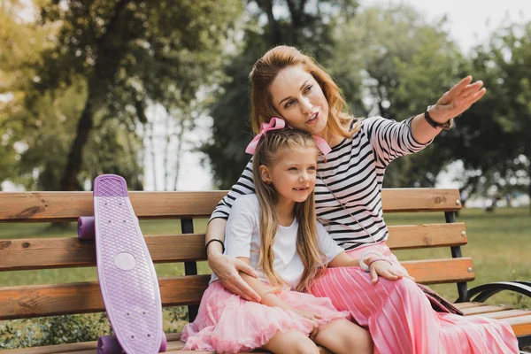 Nice Cafe Blonde Haired Caring Mother Showing Her Girl Nice — Stock Photo, Image