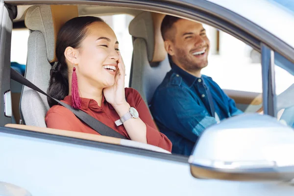 Pleasant nice woman touching her cheek — Stock Photo, Image