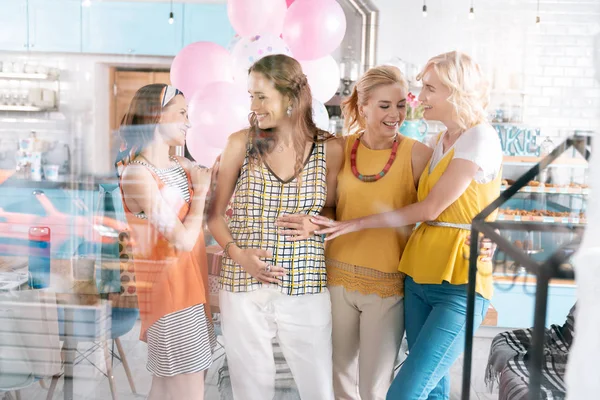 Fashionable women having baby shower in famous event agency — Stock Photo, Image