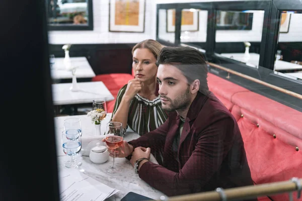 Uneasy serious couple facing doubts — Stock Photo, Image