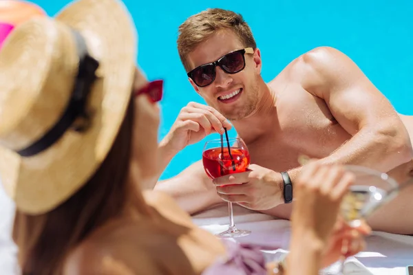 Handsome businessman feeling lovely while sunbathing with wife — Stock Photo, Image