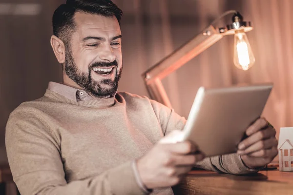 Intelligent handsome man looking at the screen — Stock Photo, Image