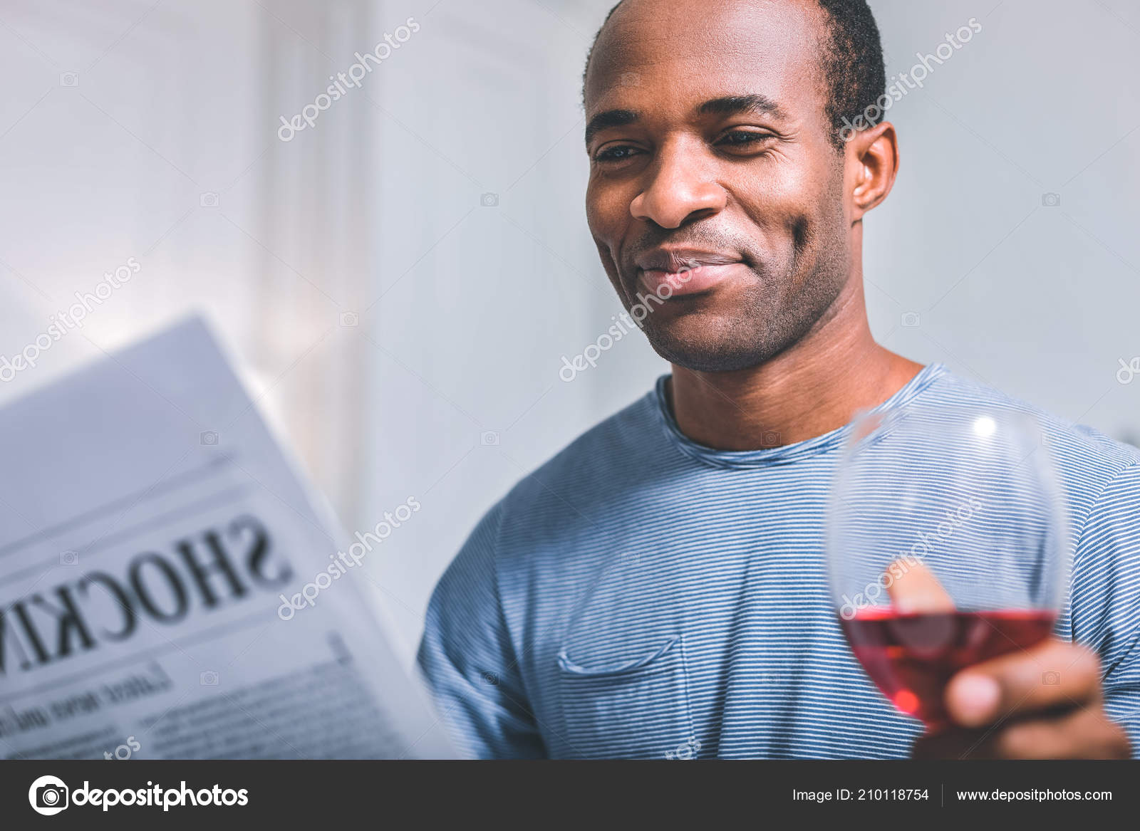 Sarcastic man reading a newspaper Stock Photo by ©Dmyrto_Z 210118754