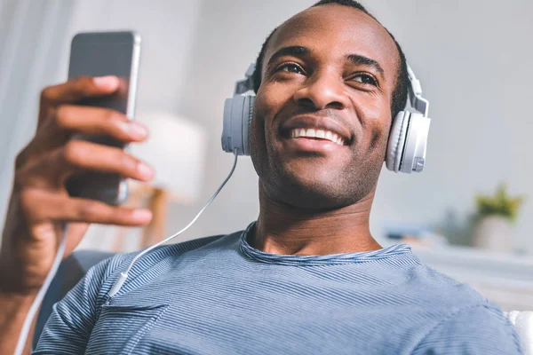 Attractive guy listening to the music — Stock Photo, Image