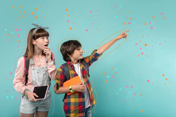 Active teenagers visiting a planetarium and feeling impressed — Stock Photo, Image