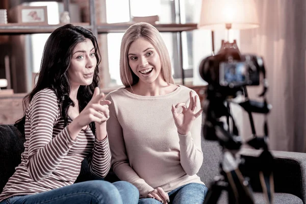 Delighted female bloggers recording a video — Stock Photo, Image