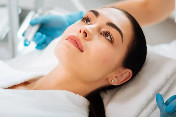 Nice young woman having a beauty procedure — Stock Photo, Image