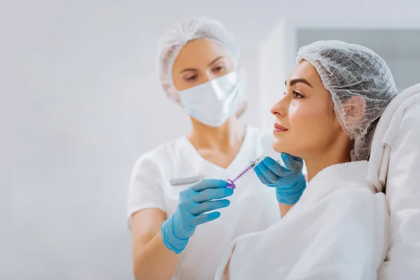 Beauty injection being done in the chin — Stock Photo, Image