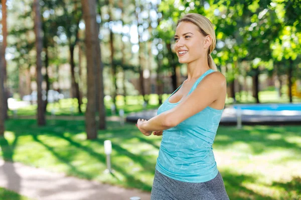 Positive nice woman caring about her health — Stock Photo, Image