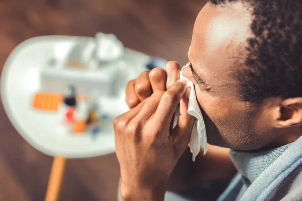 Ill afro american man having running nose — Stock Photo, Image