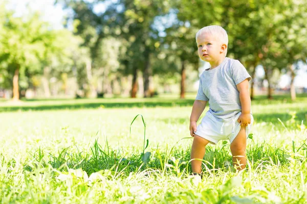 Curious little child looking aside very attentively — Stock Photo, Image