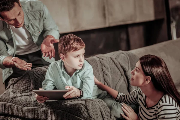 Little gamer making conflict situation at home