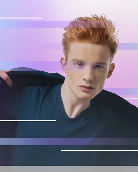 Handsome man looking into the mirror and evaluating his haircut — Stock Photo, Image