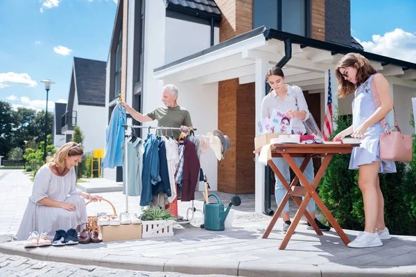 Big happy family feeling amazing while coming to traditional weekend yard sale — Stock Photo, Image