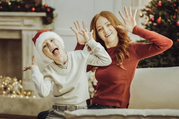 Happy mother and son making faces — Stock Photo, Image