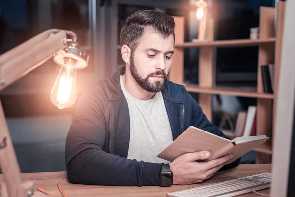Concentrated programmer being in office at night — Stock Photo, Image