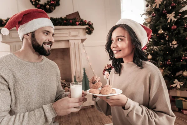 Happy man giving glass with milk — Stock Photo, Image