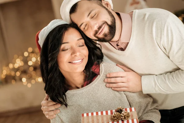 Happy positive couple closing their eyes — Stock Photo, Image