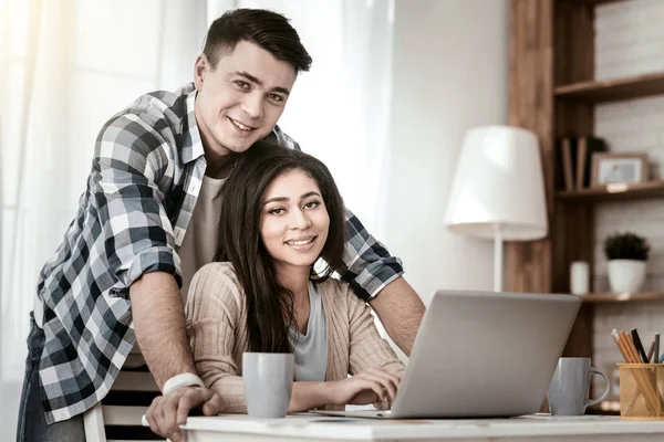 Loving couple spending day at home while working — Stock Photo, Image