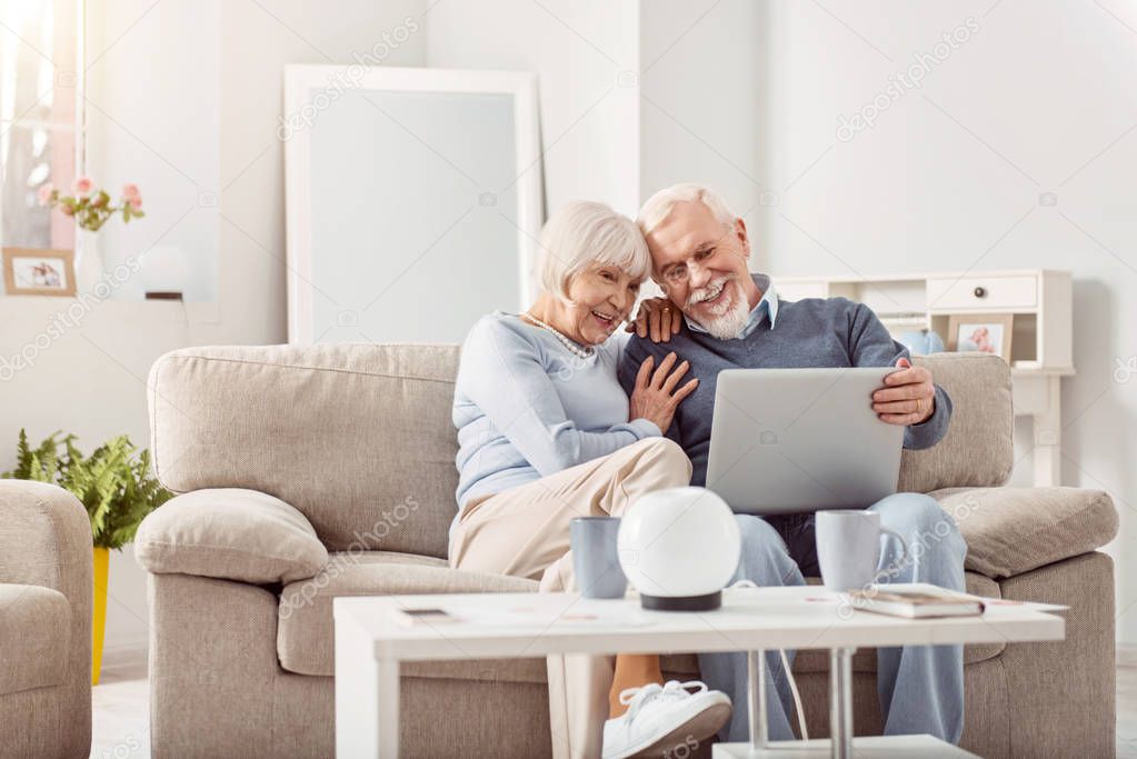 Amazing couple of pensioners spending time at home