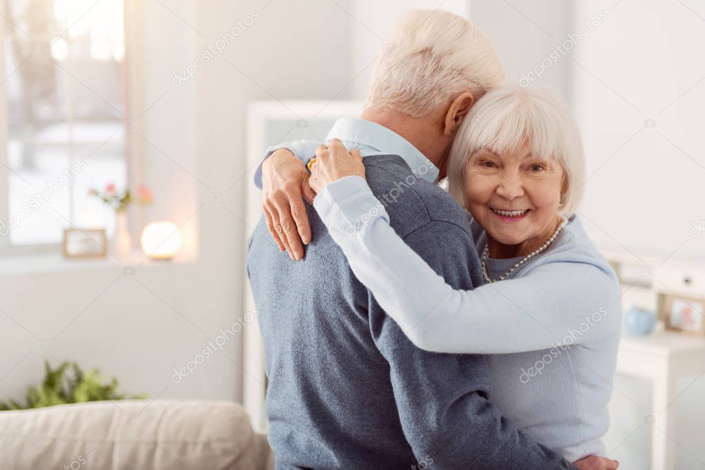 Happy mature couple celebrating their marriage anniversary