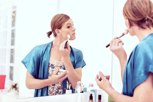 Beautiful uncertain transgender man wearing silk blue nightie — Stock Photo, Image