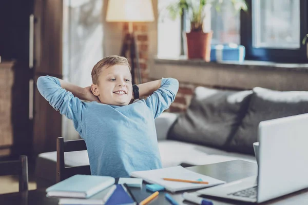 Positivo niño encantado teniendo pausa —  Fotos de Stock