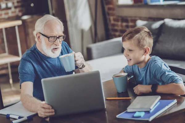 Joyful boy looking at computer — Stock Photo, Image