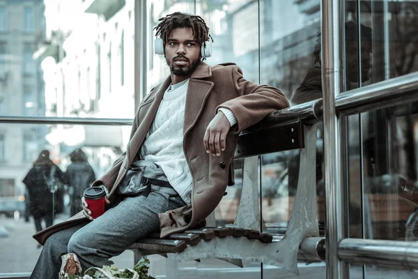 Concentrated brunette male waiting for his girlfriend — Stock Photo, Image