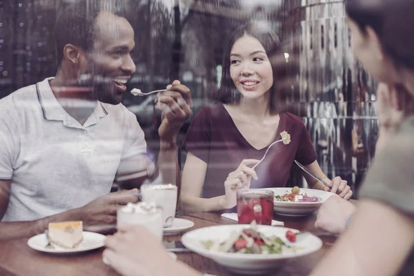 Pleased people enjoying their meal — Stock Photo, Image