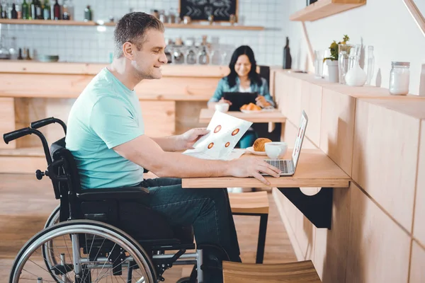 Disabled handsome man working remotely — Stock Photo, Image