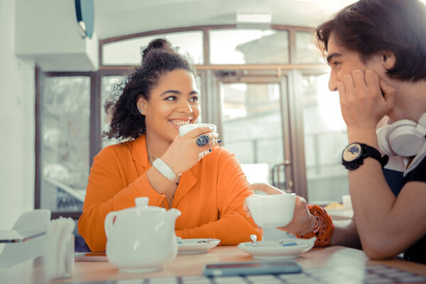 Students visiting a favourite cafe after classes