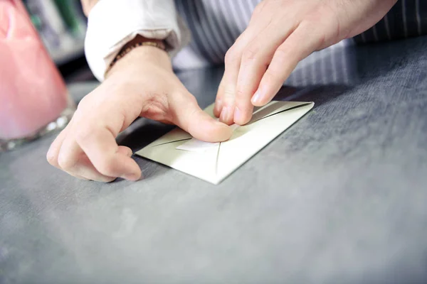 Close up of hands that preparing letter — Stock Photo, Image